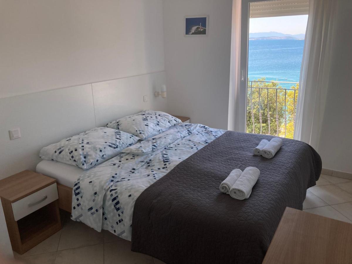 Apartmani Plaza Selce Esterno foto